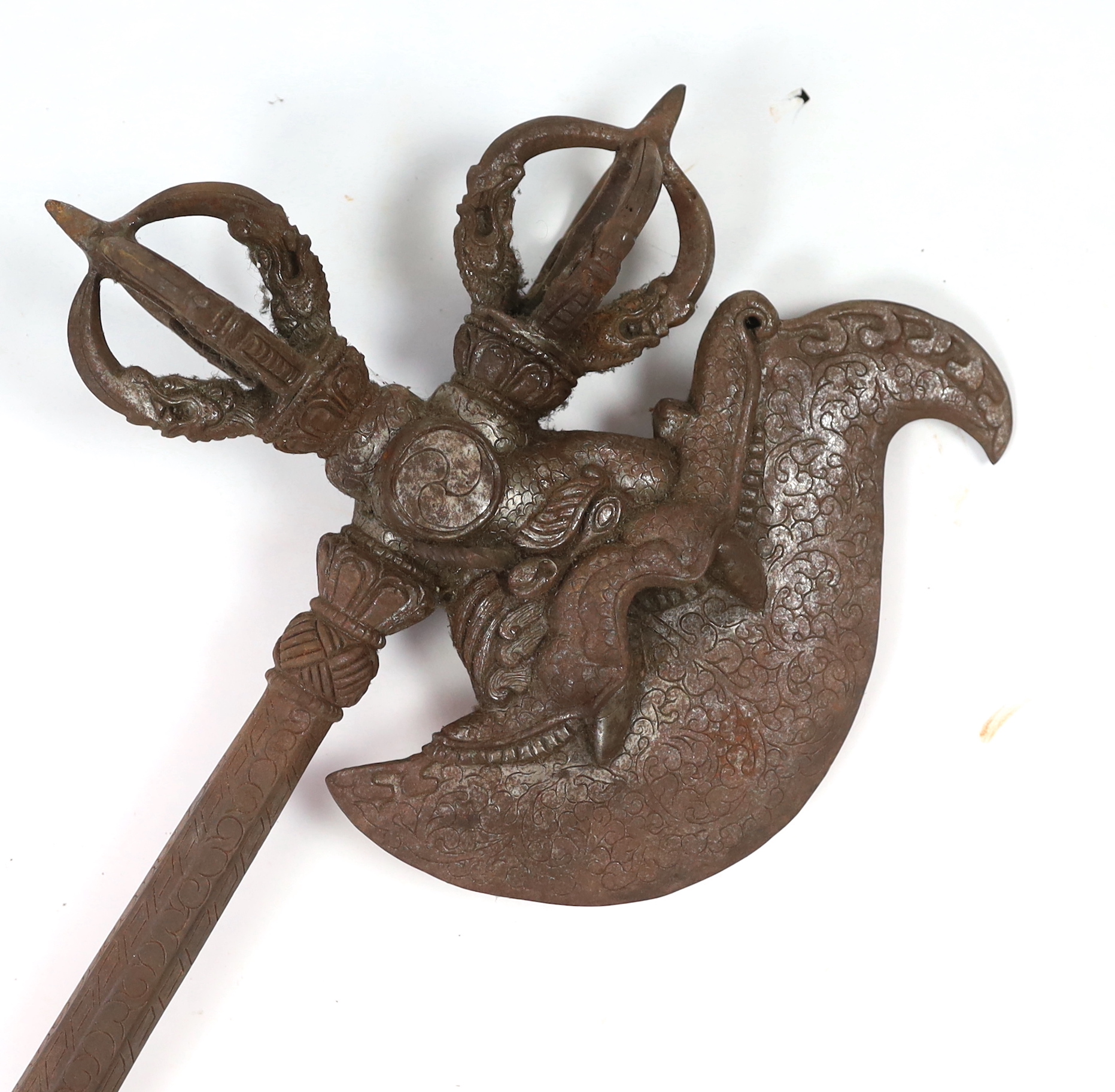 An ornate Buddhist iron axe, 91cm long